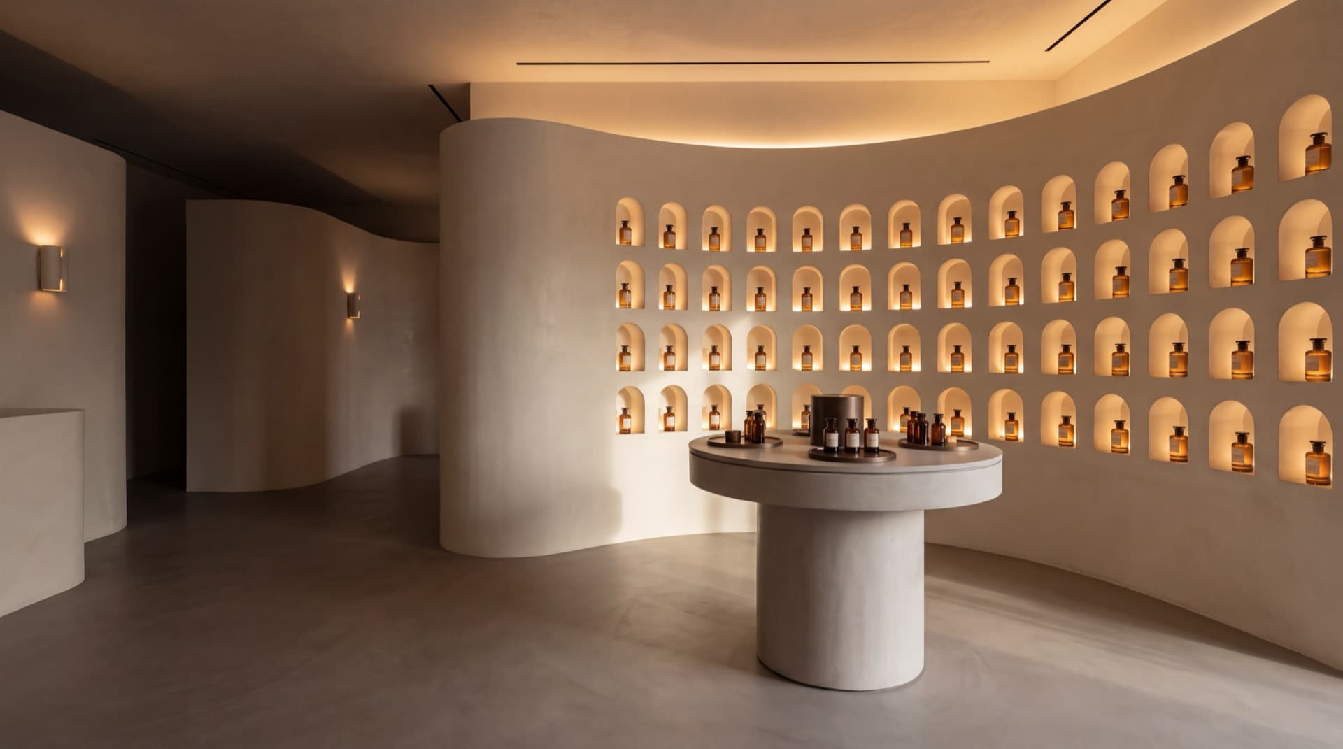 Perfumery — a wall of lit arched niches — concept visualization