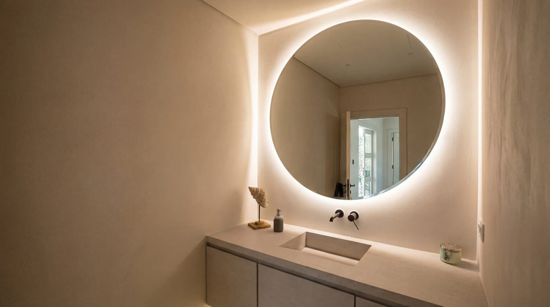 Backlit Mirror — Round mirror with integrated vanity