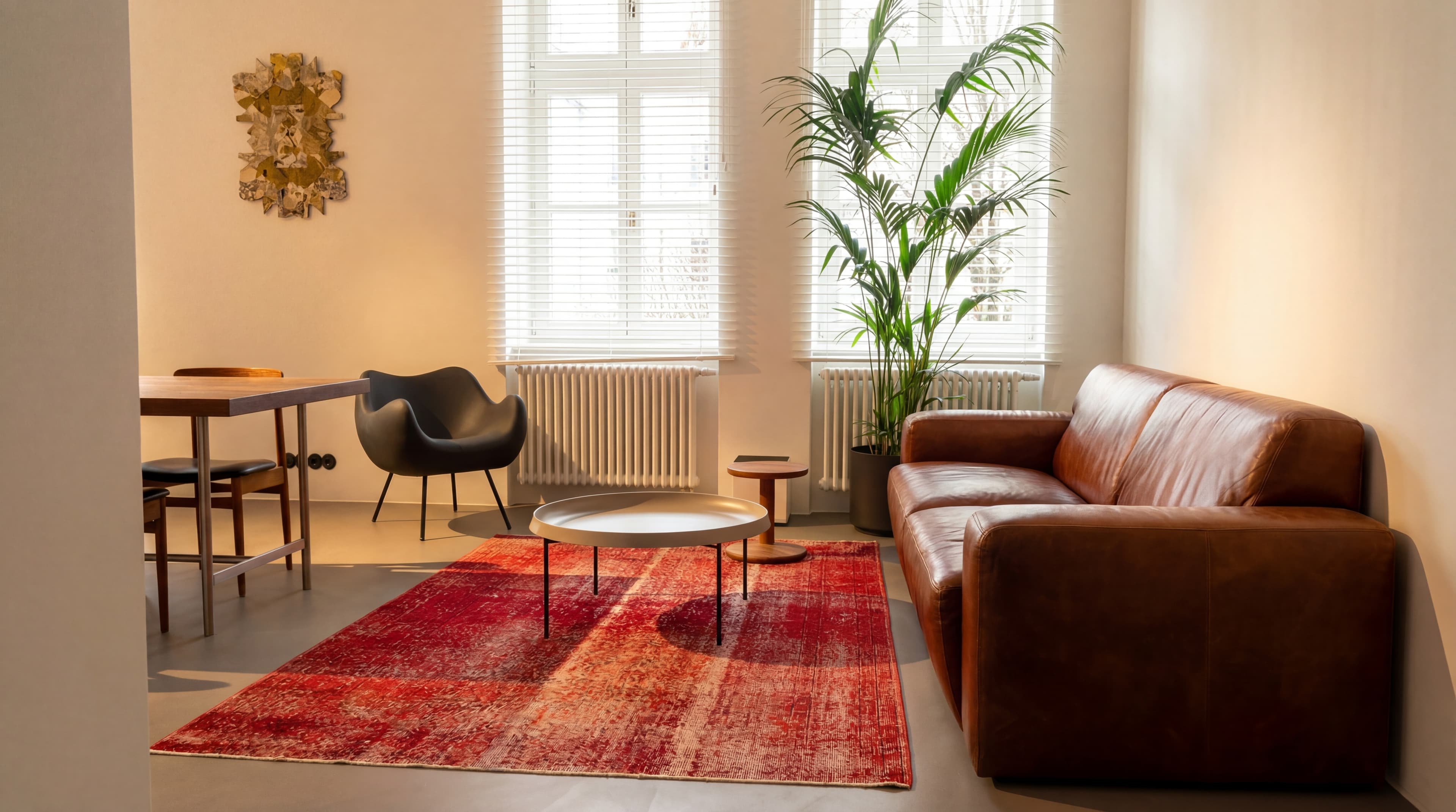 Leather & Microcement — Brown sofa on seamless floor