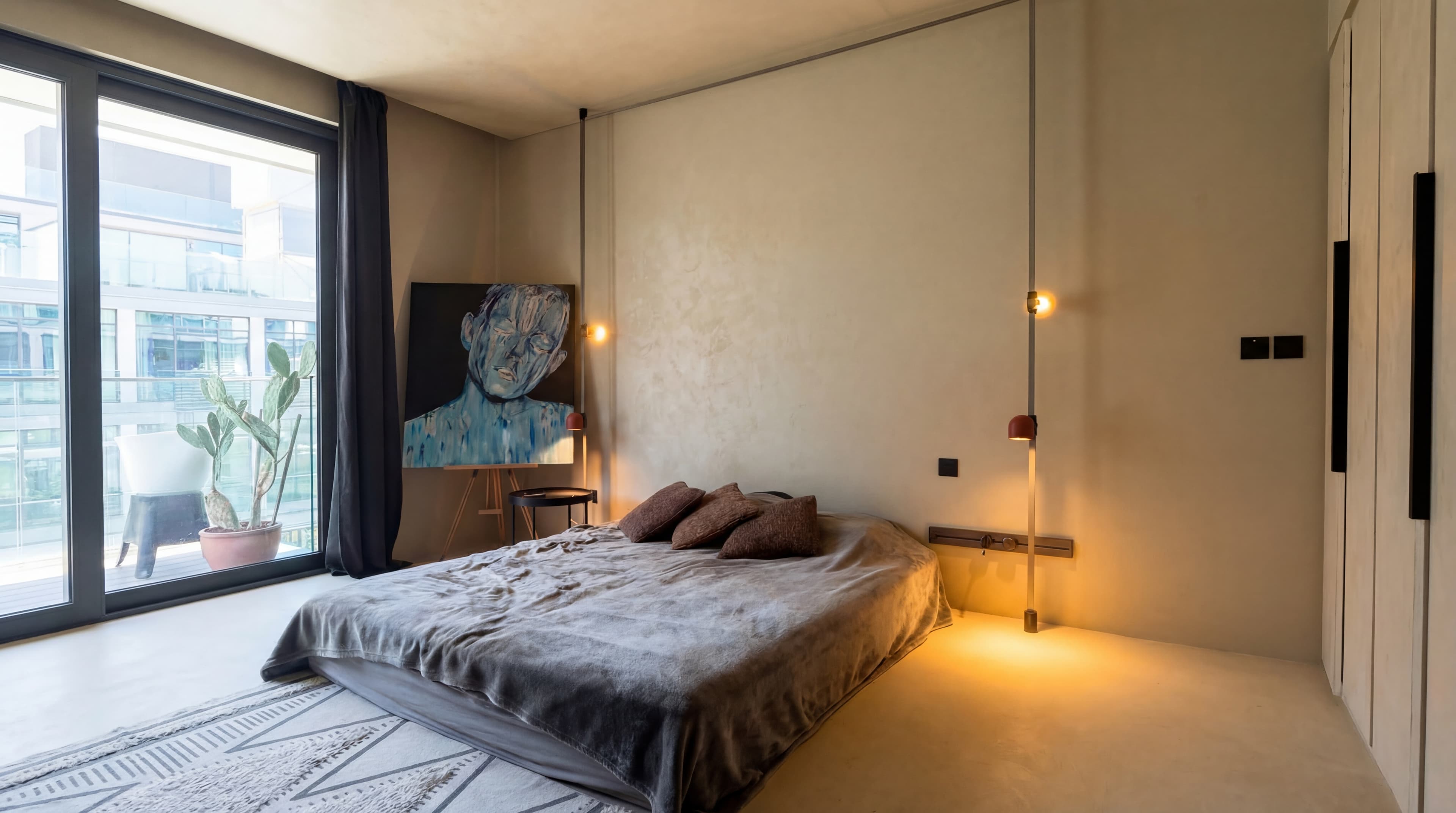 Urban Bedroom — Balcony city view with pendant bulbs