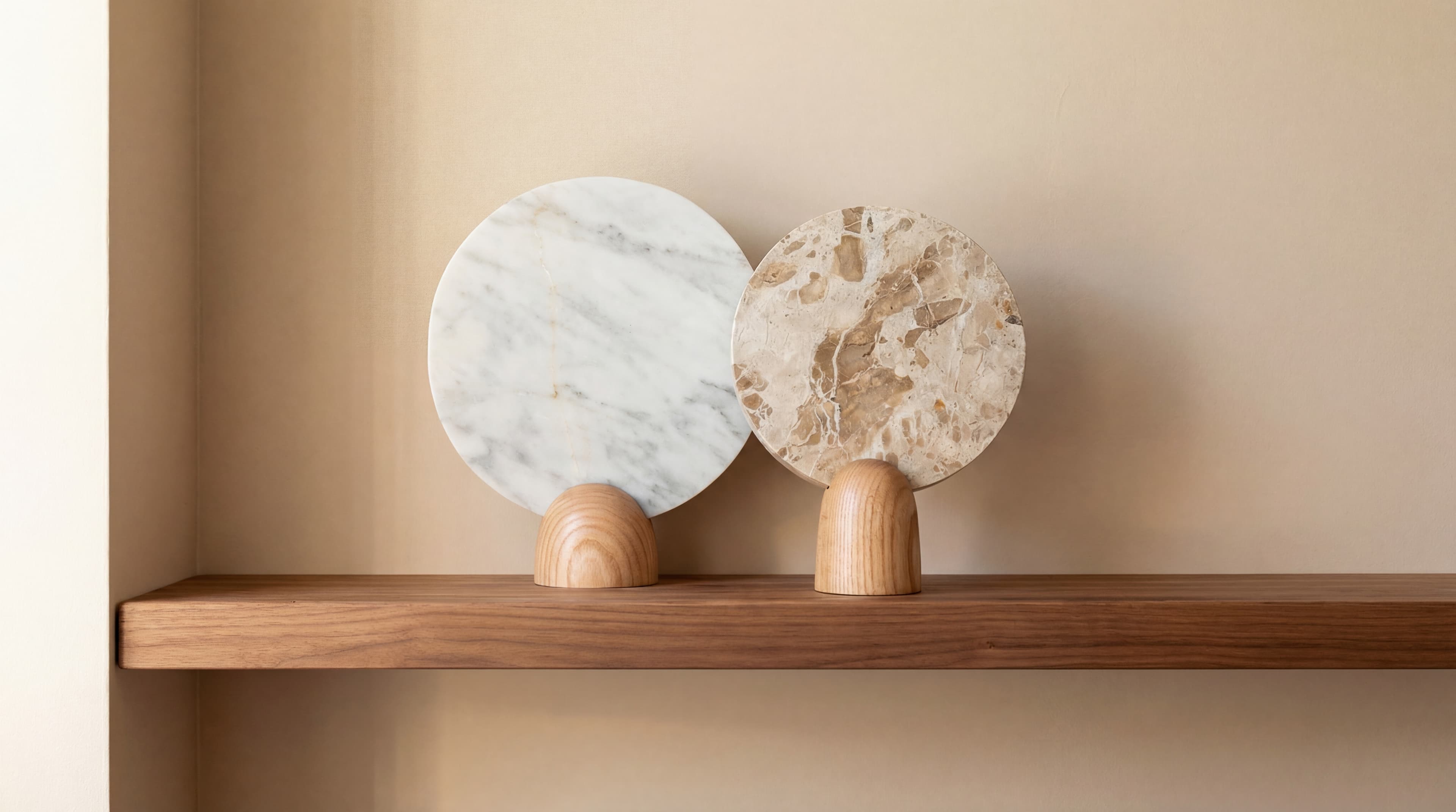 Surface Detail — Decorative marble objects on wood shelf