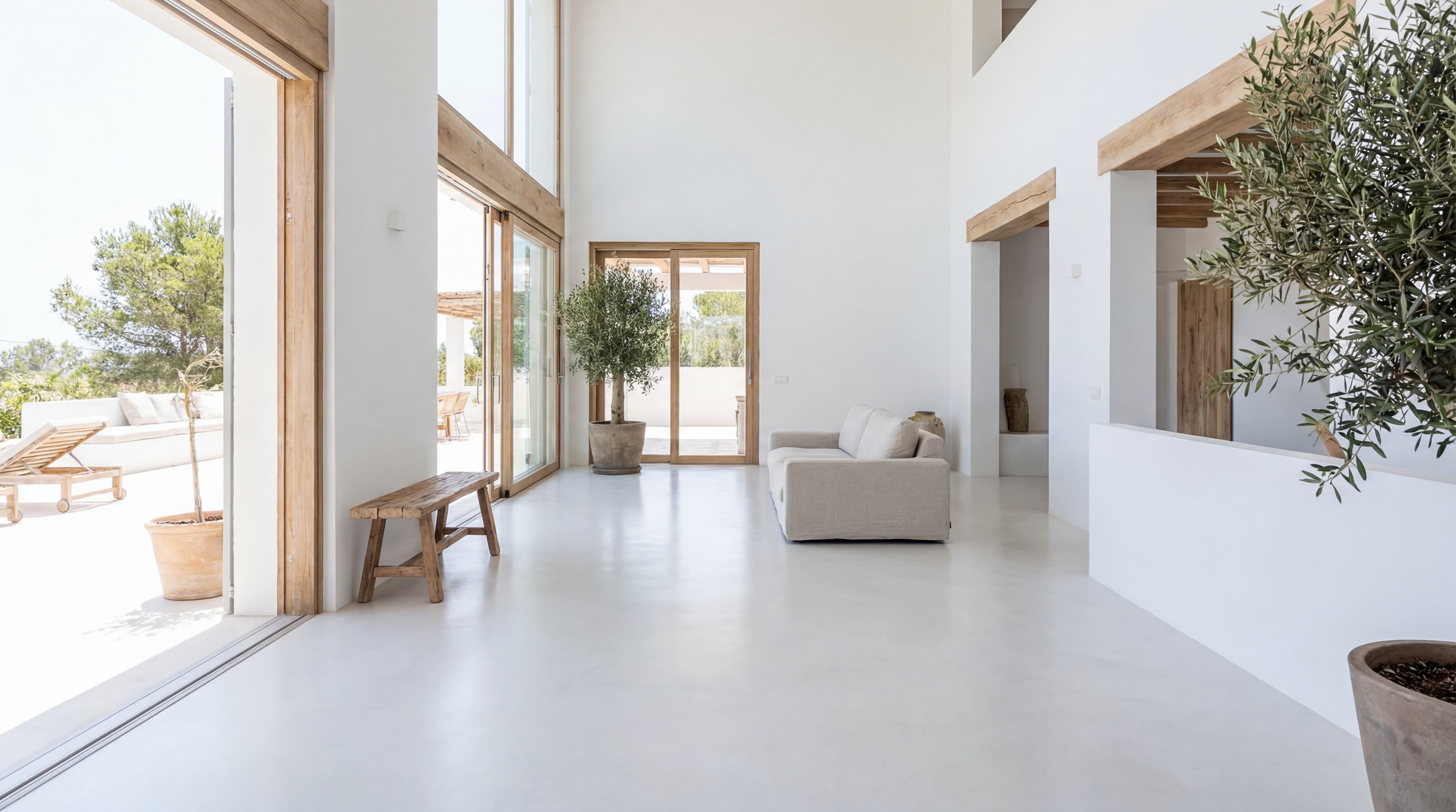Seamless microcement floor in a modern minimalist living room