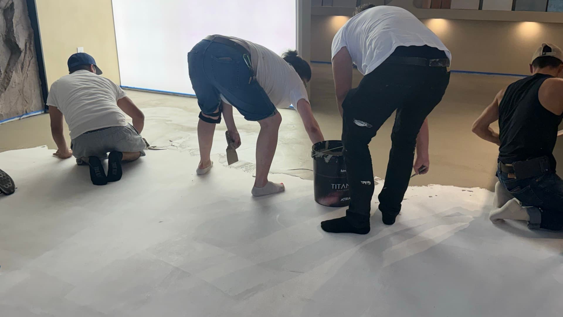 Laying the finish coat shoulder-to-shoulder.